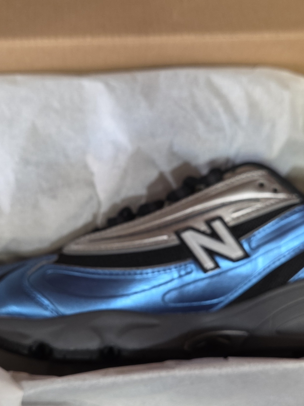 New Balance Metallic Blue and Silver Running Sneaker